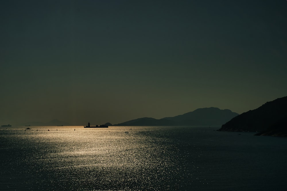 silhouette of building on island during daytime