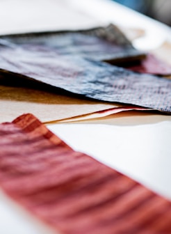 red and black striped textile