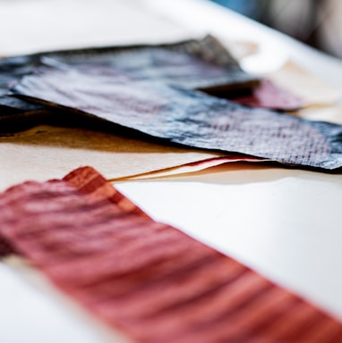 red and black striped textile