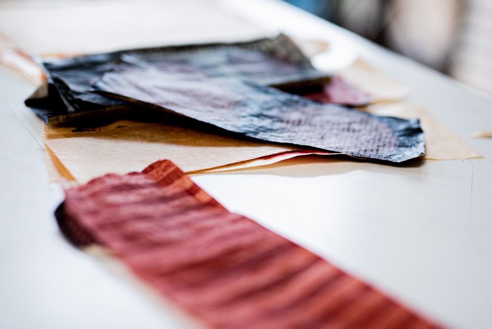 red and black striped textile