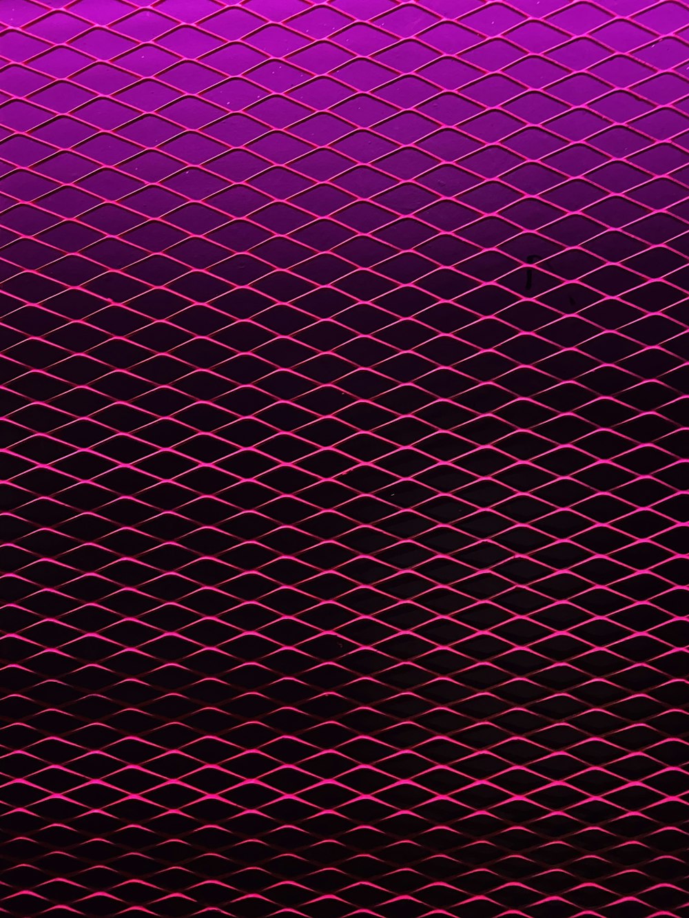 purple and pink polka dot textile