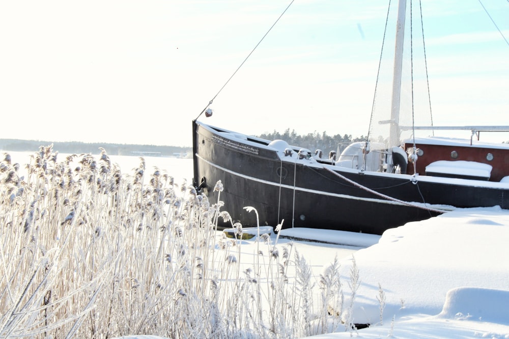 white boat on body of water during daytime