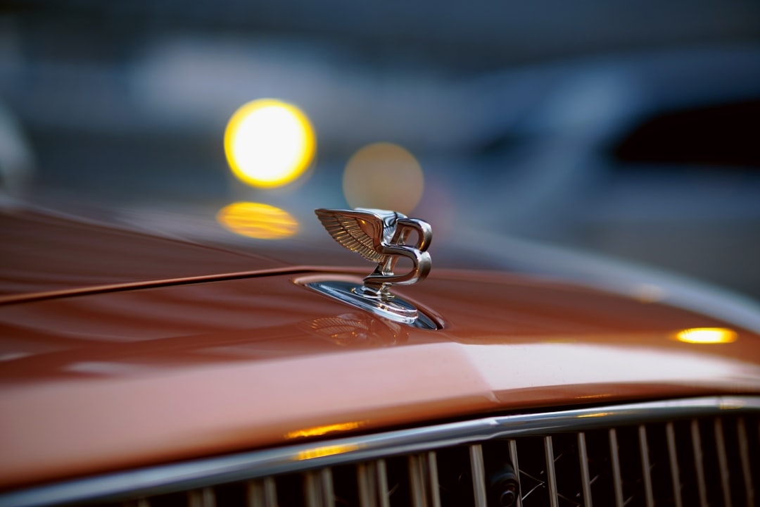 silver car with yellow and silver car