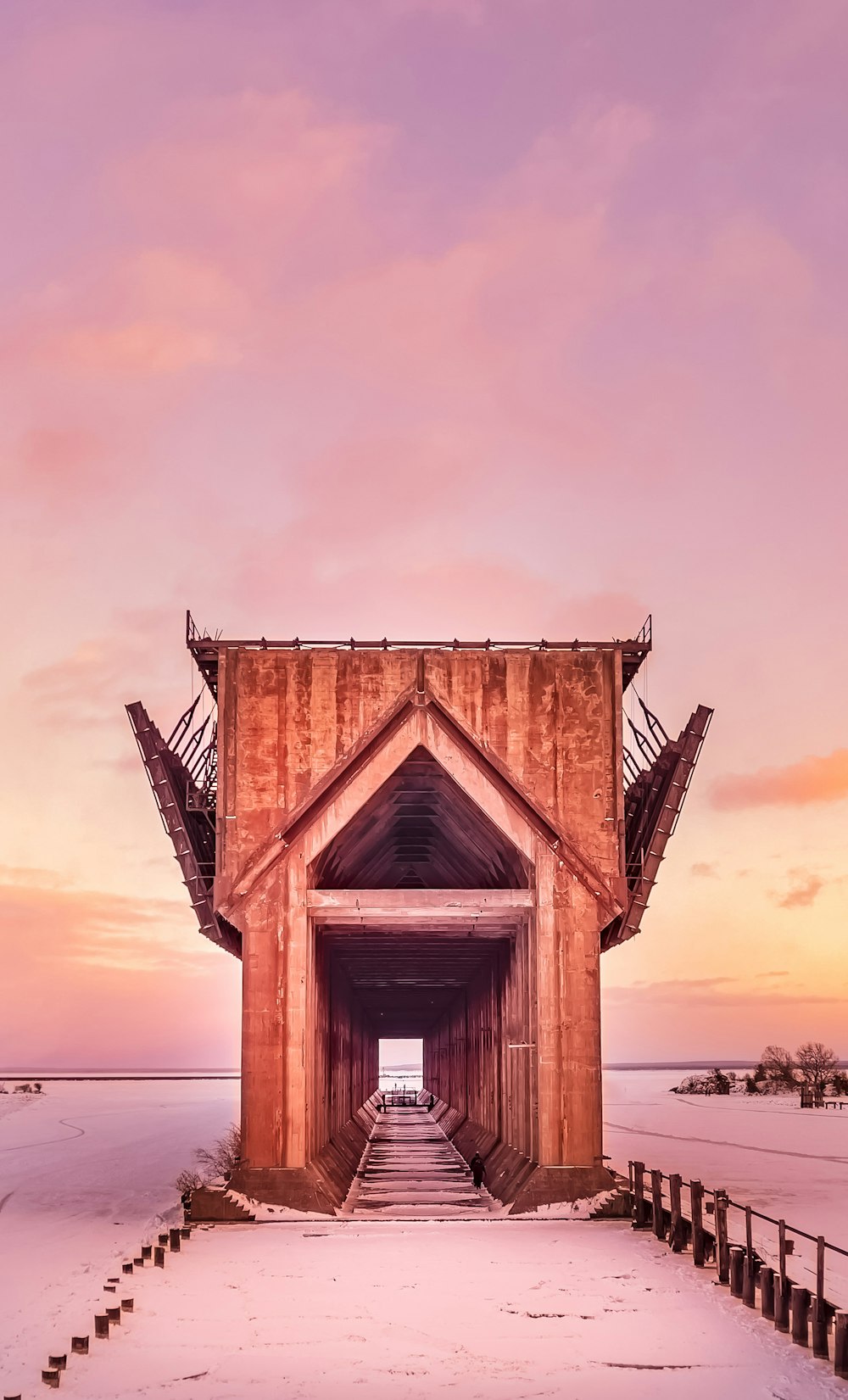 brown wooden house under gray sky during daytime