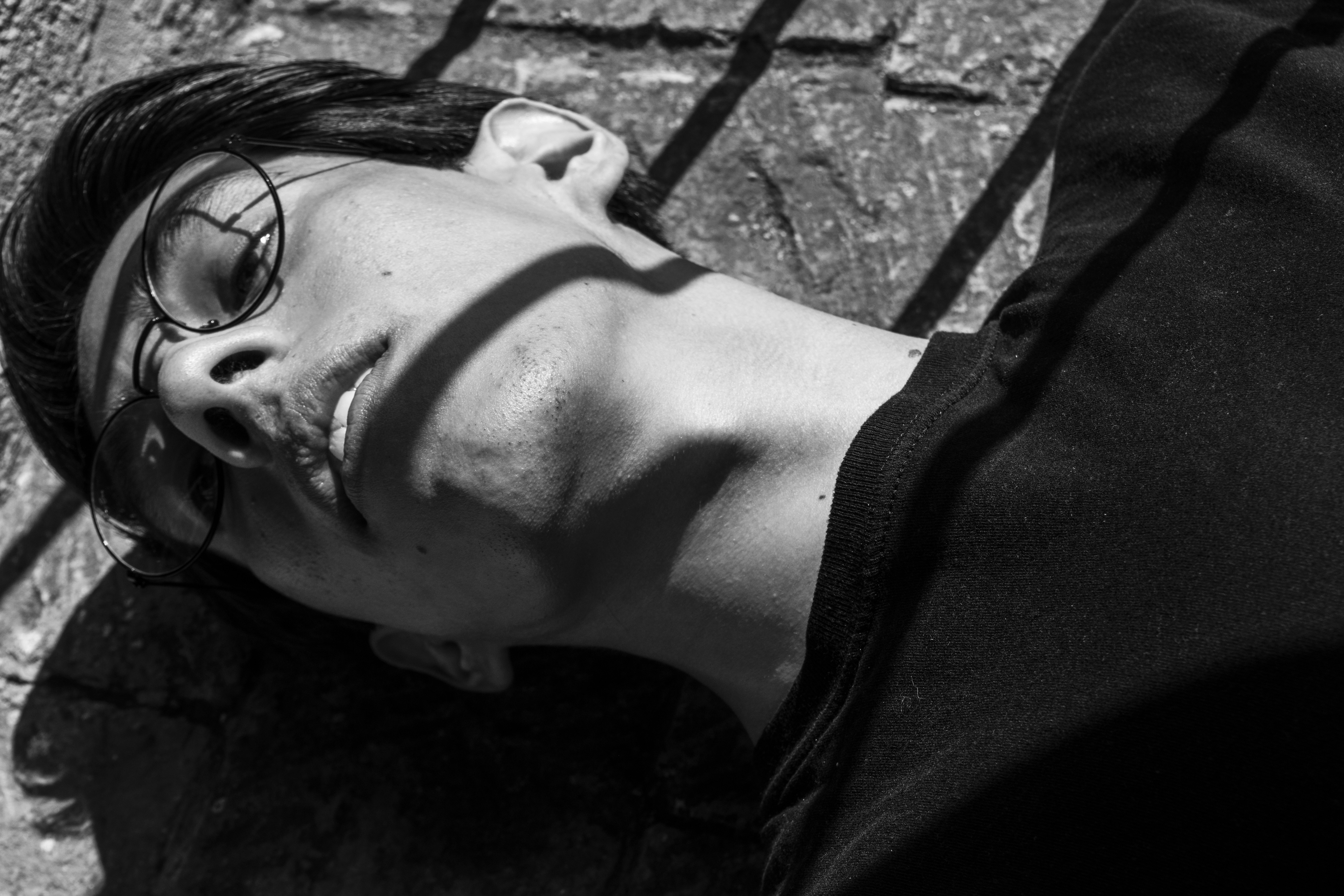 grayscale photo of woman in black hoodie