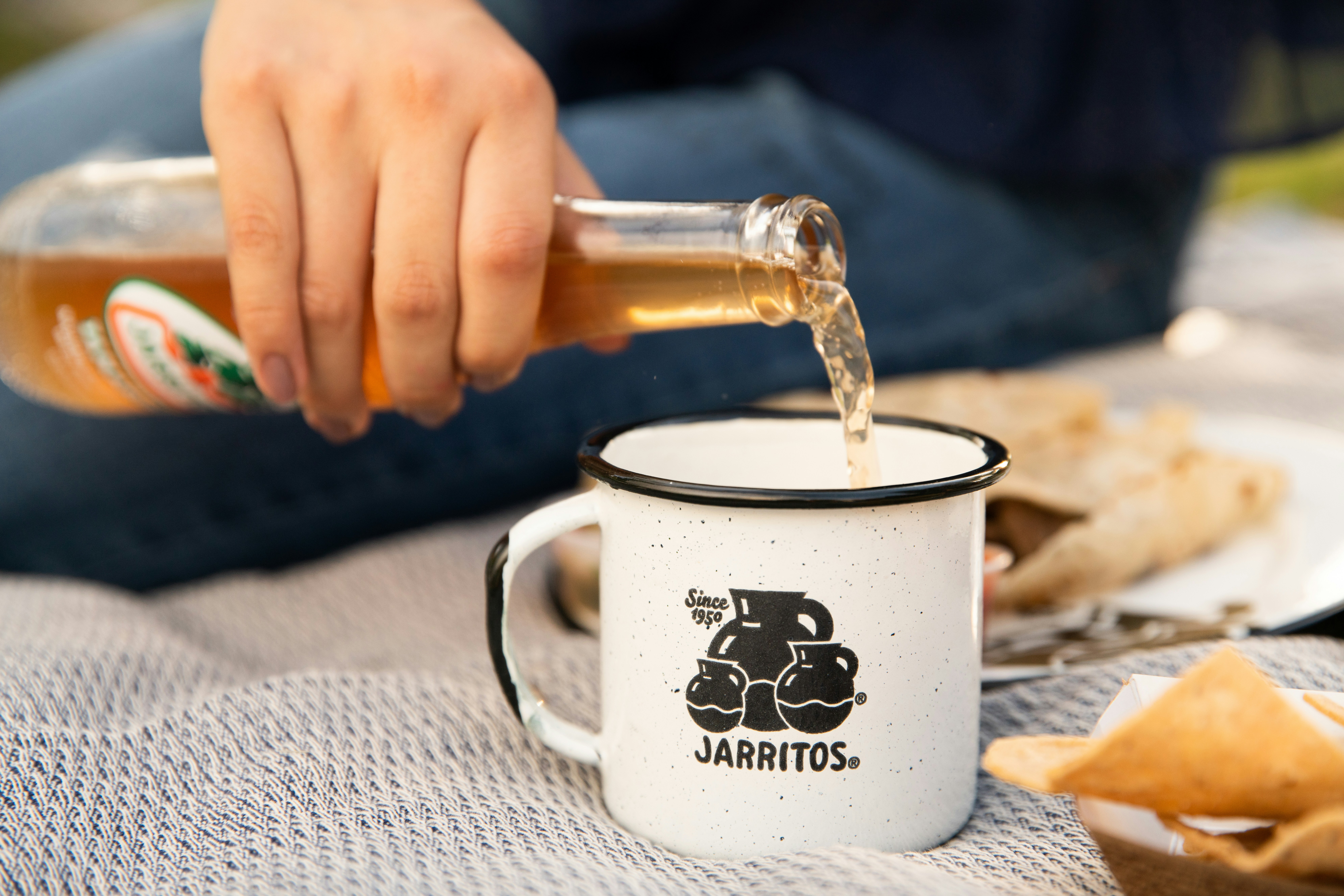 person holding white ceramic mug with coffee