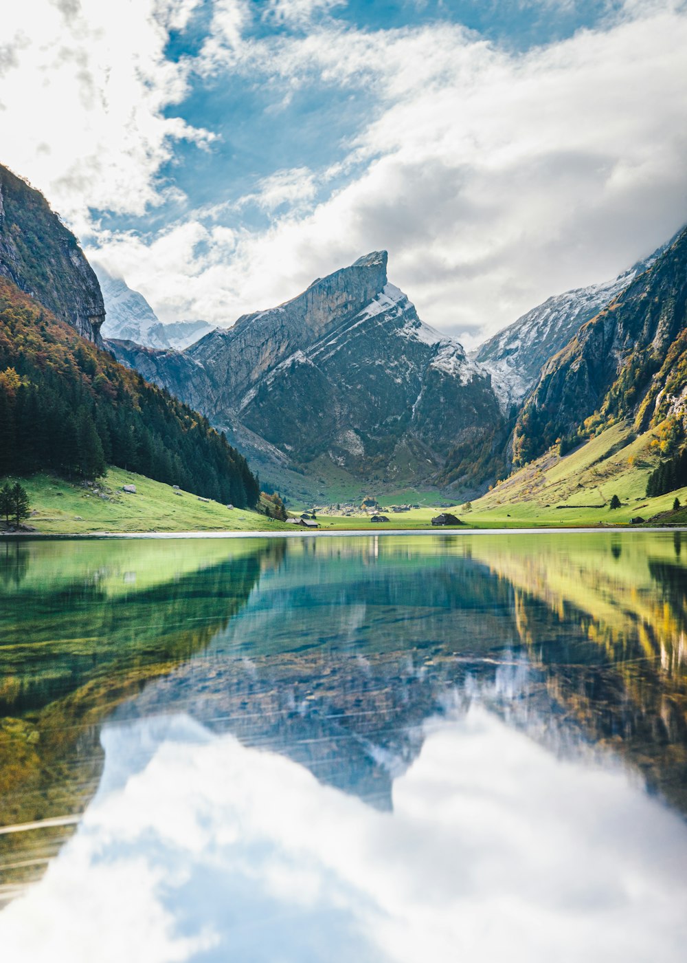 lake in the middle of mountains