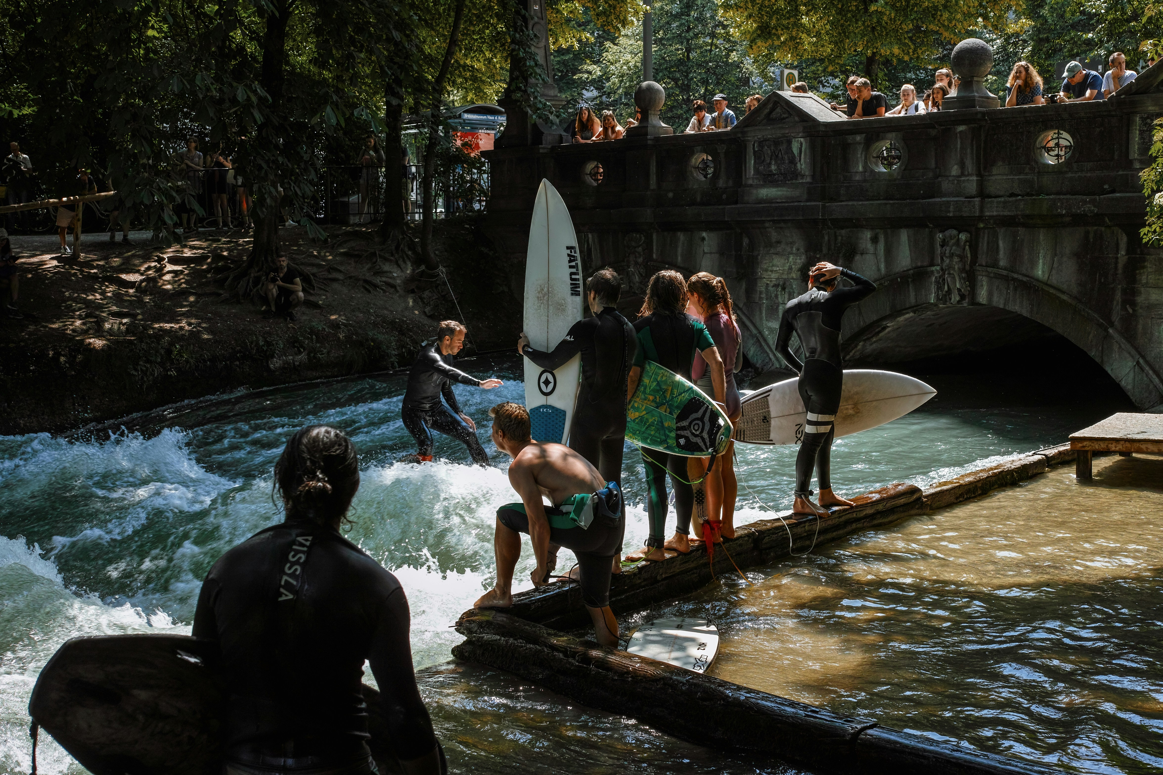people in swimming pool during daytime