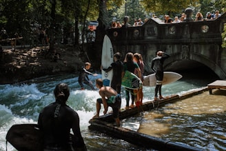 people in swimming pool during daytime