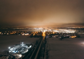 city with high rise buildings during night time