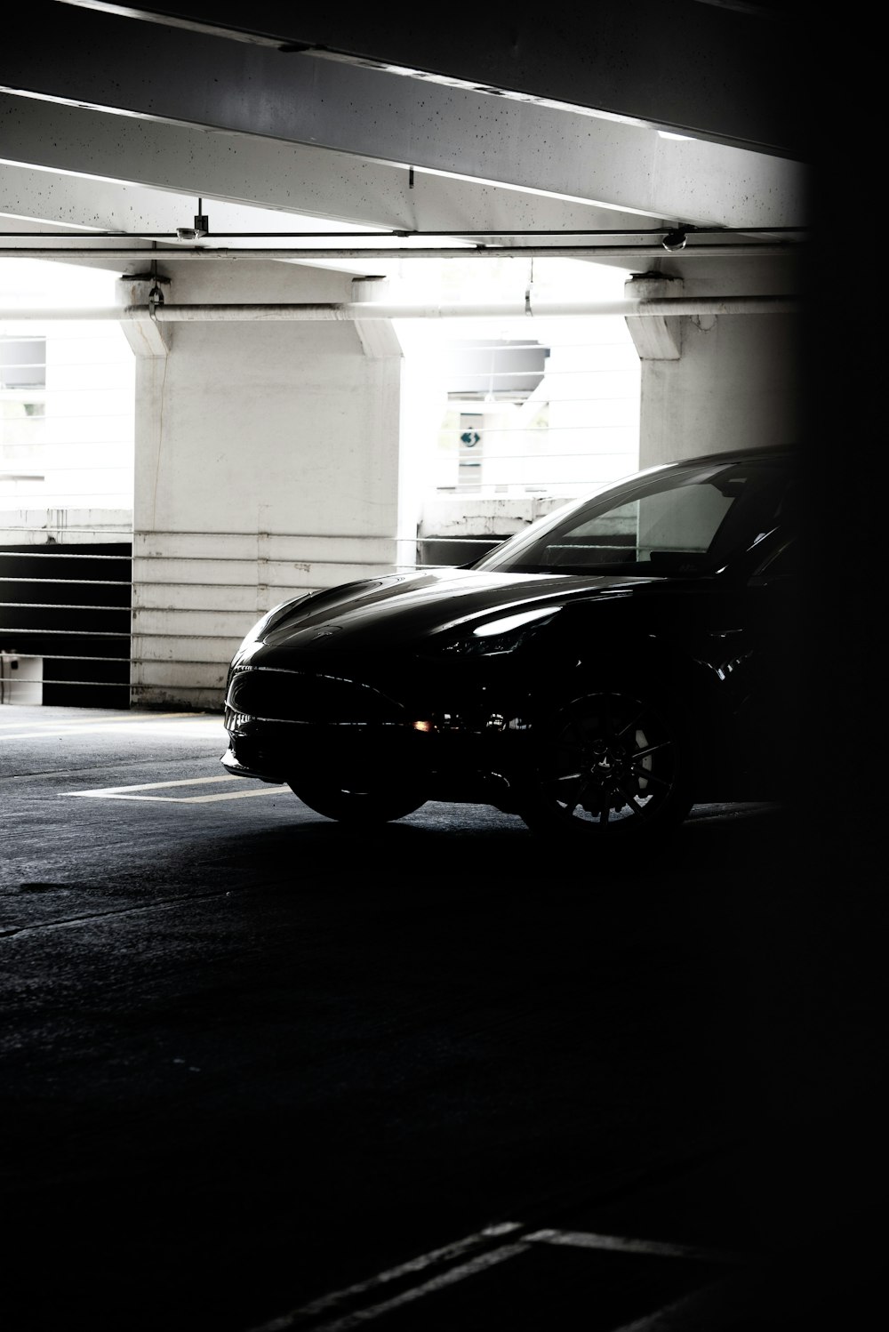 black car parked in garage