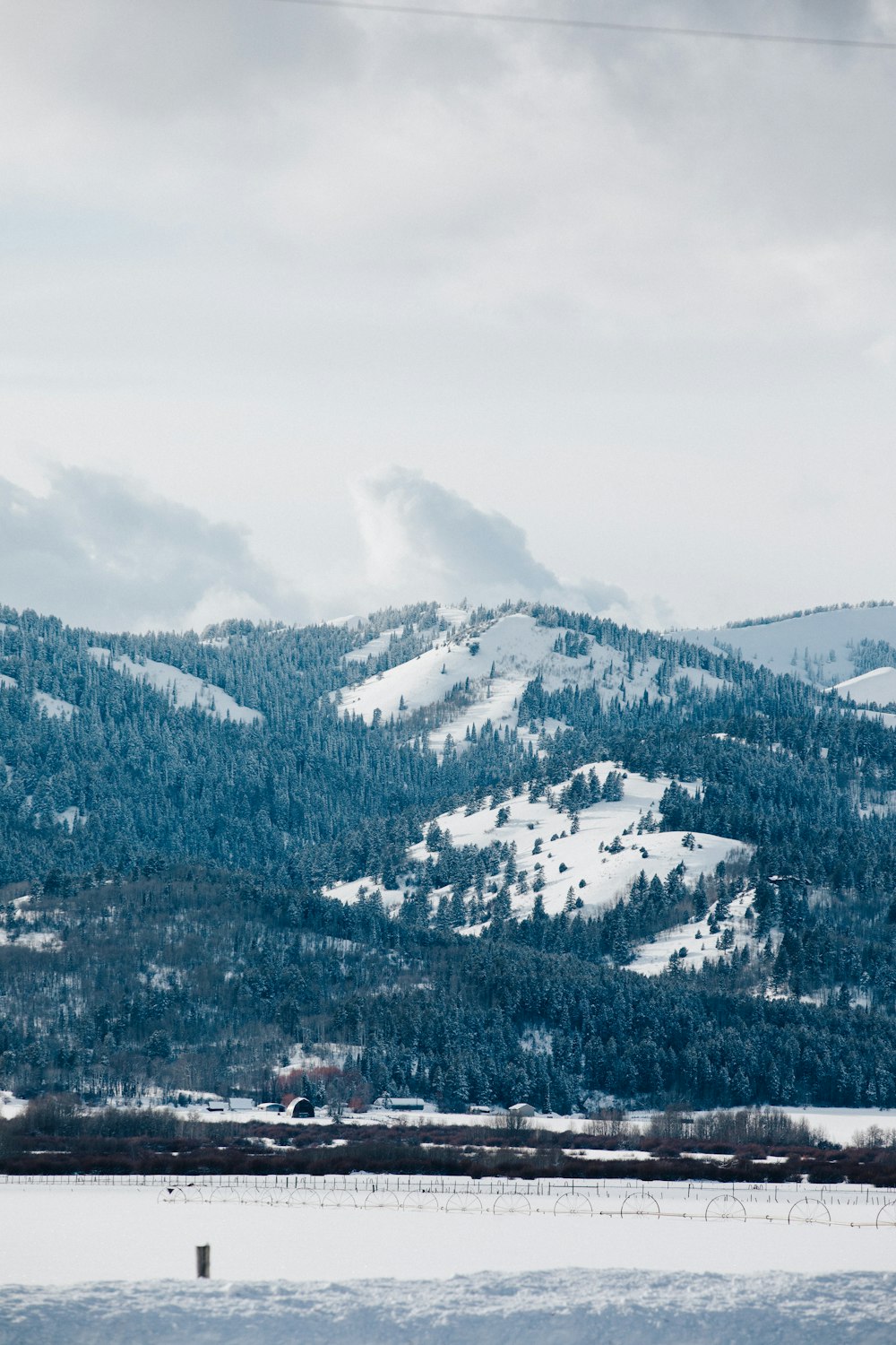 snow covered mountain during daytime