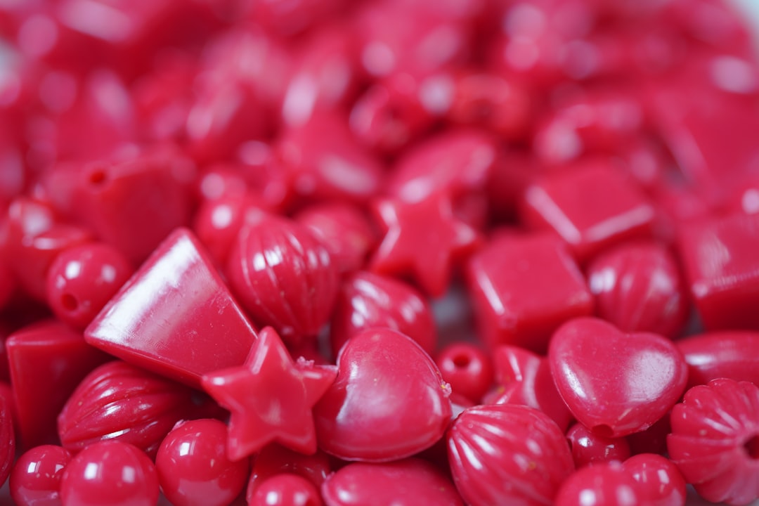 red heart candies in close up photography