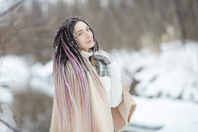 Woman in a scarf and coat