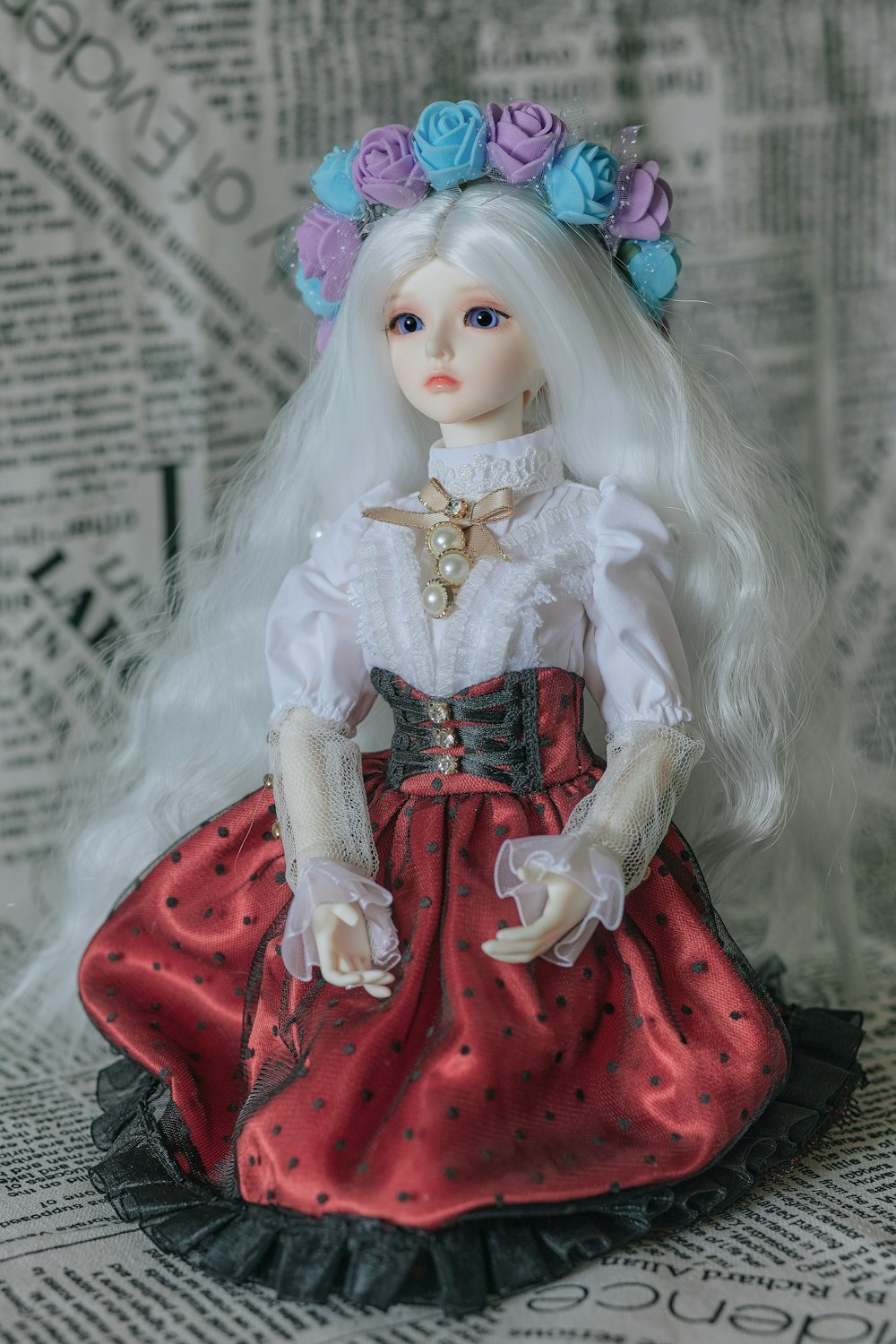 girl in red and white dress doll
