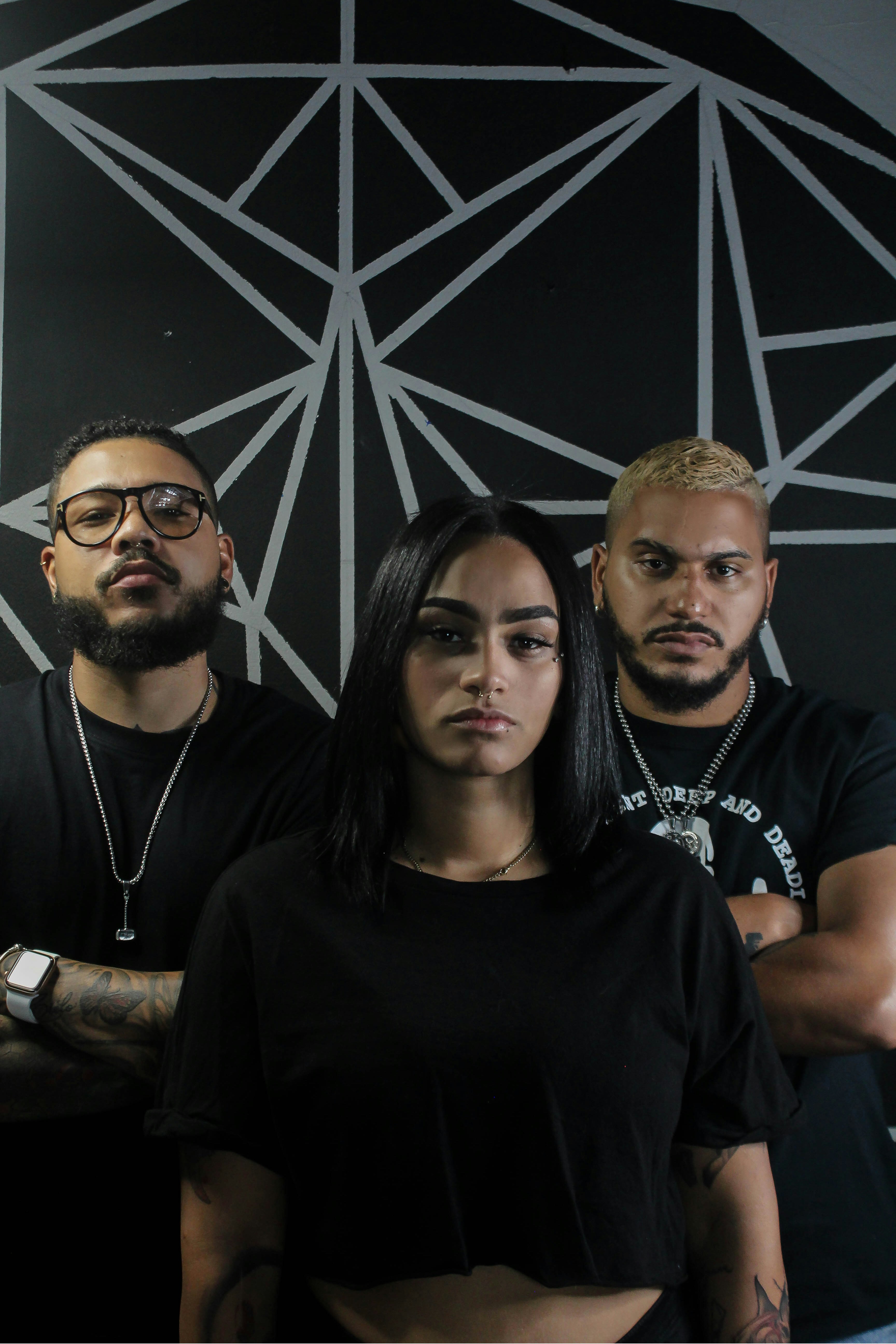 man in black crew neck shirt beside woman in black crew neck shirt