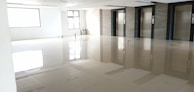 Shiny, polished floors in an empty apartment ready for new occupants.