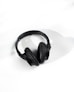 black wireless headphones on white table