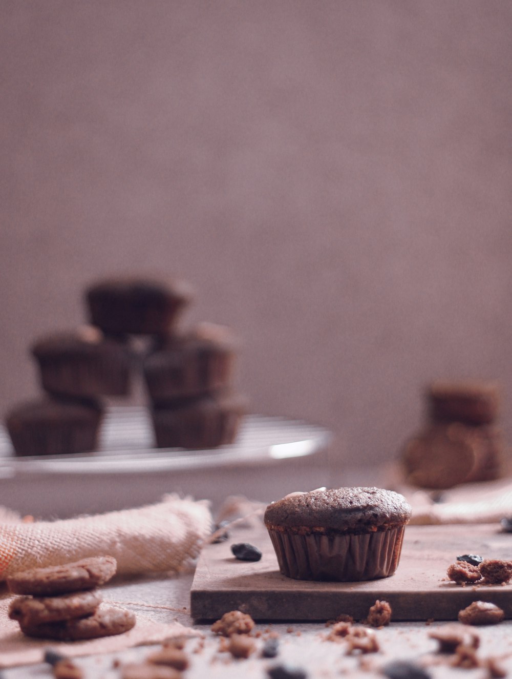 brown cupcake on white ceramic plate