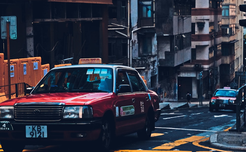 red and white taxi cab on the street