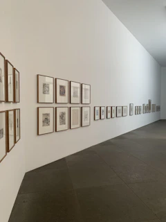 white wall with brown wooden photo frame
