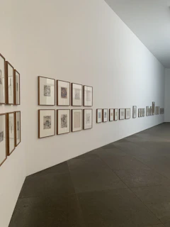 white wall with brown wooden photo frame