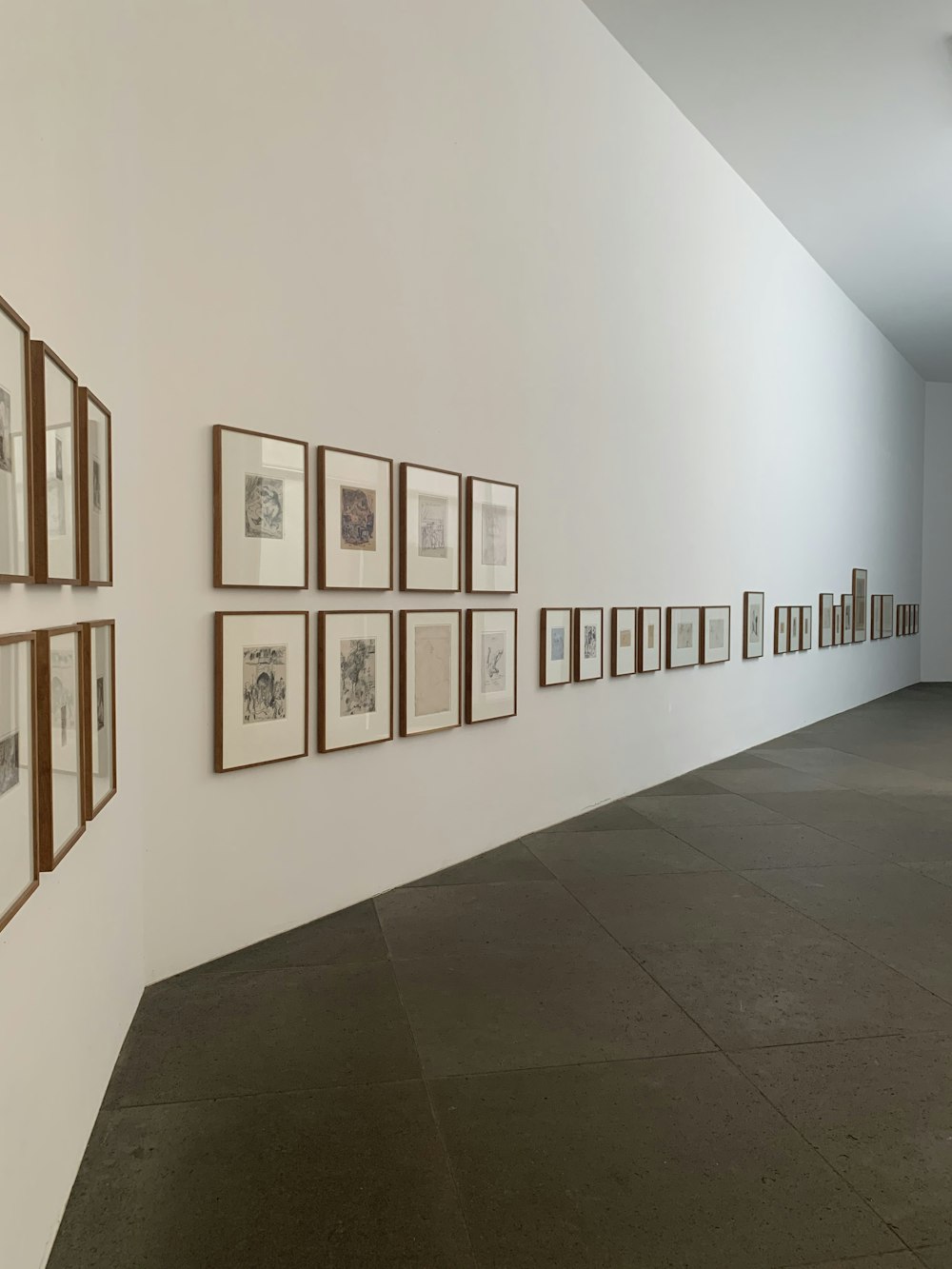 white wall with brown wooden photo frame