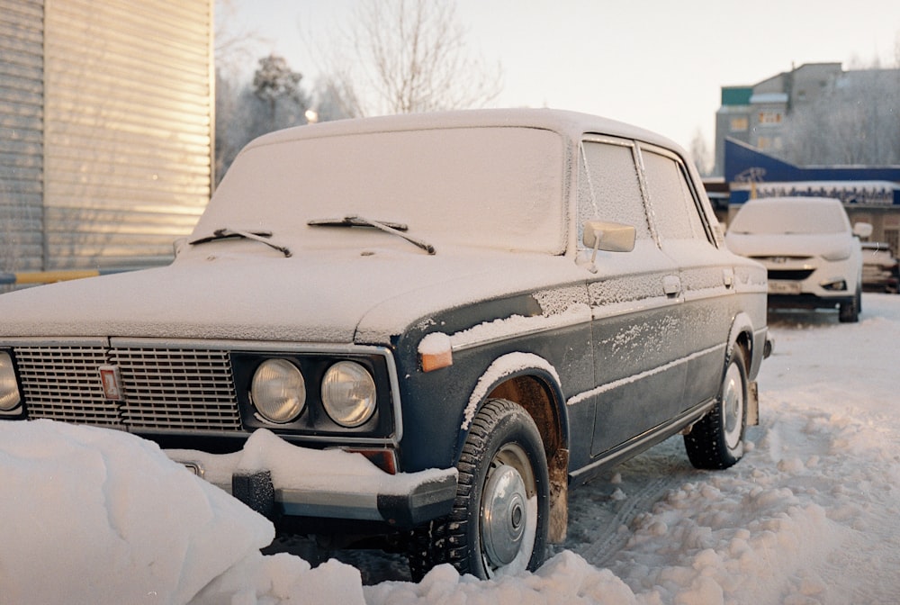 white car covered with snow