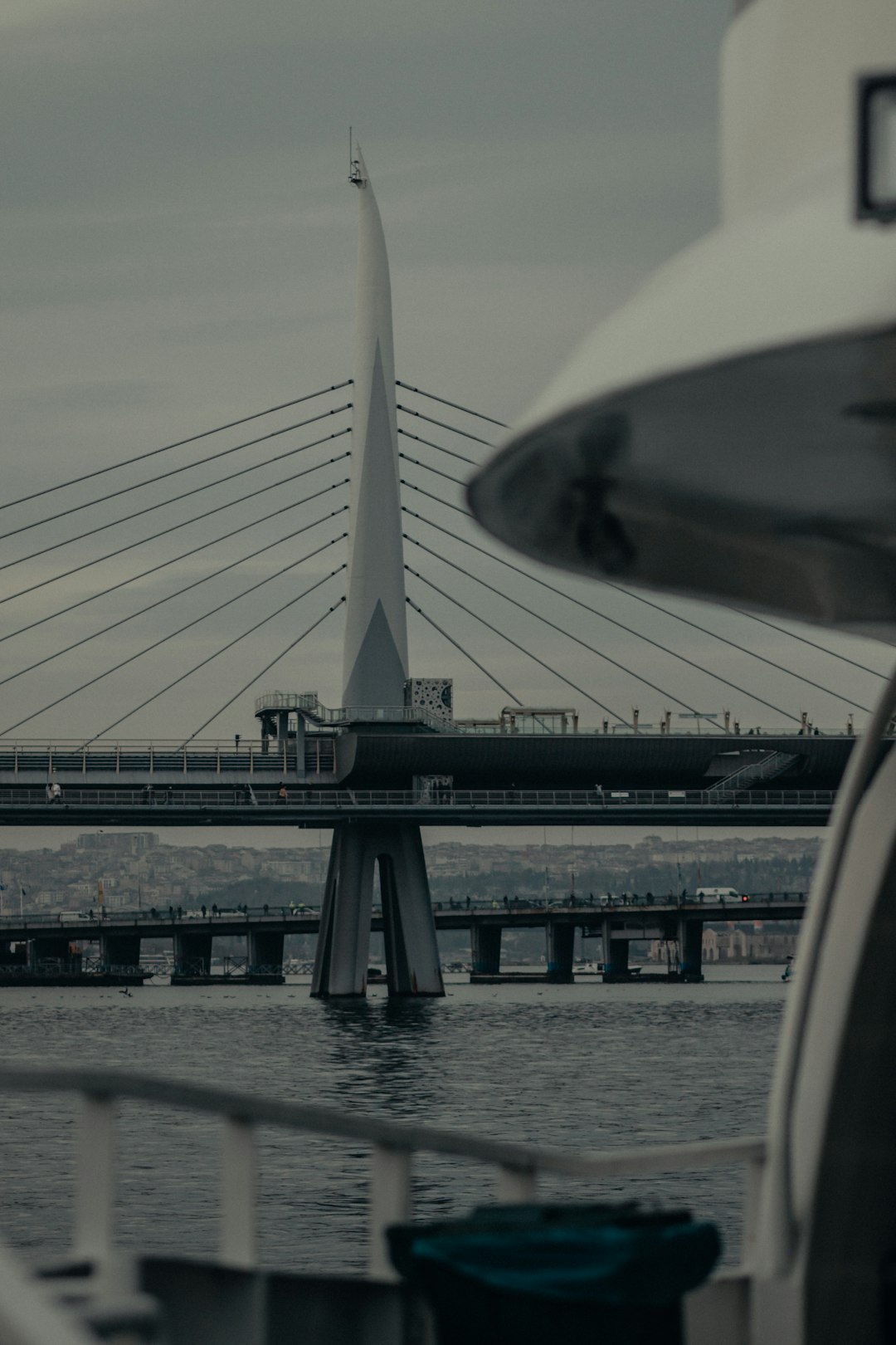 white bridge over water during daytime