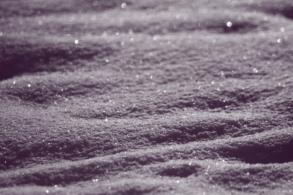 water droplets on brown sand