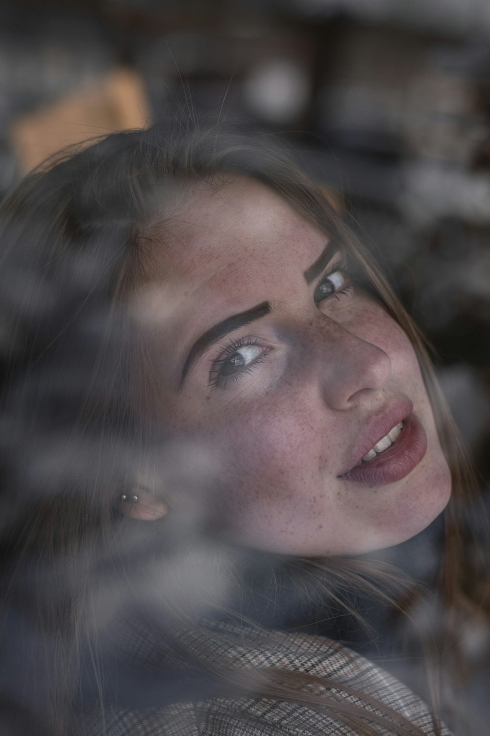 woman with brown hair smiling