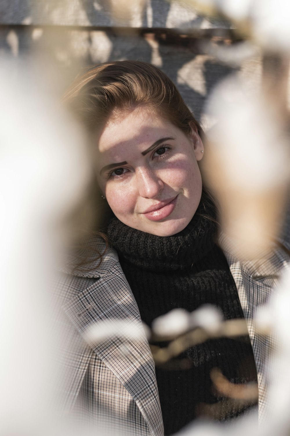 smiling woman in black scarf and black scarf