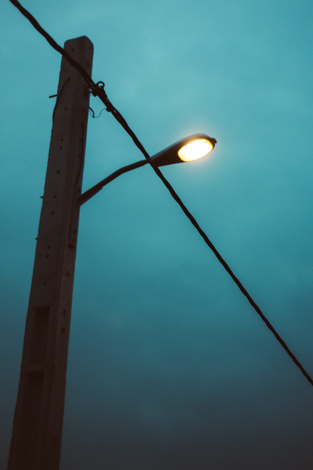 black light post turned on during night time