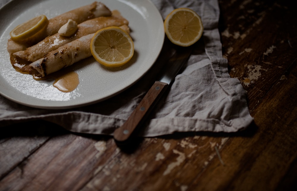 bread on white ceramic plate