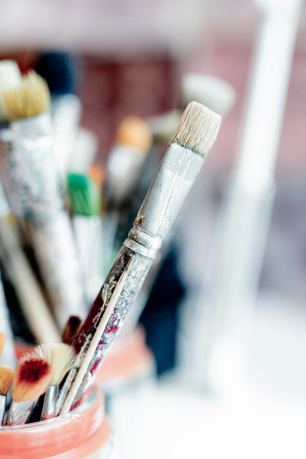 white and brown paint brush