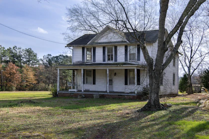 white and gray 2 storey house