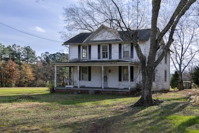 white and gray 2 storey house