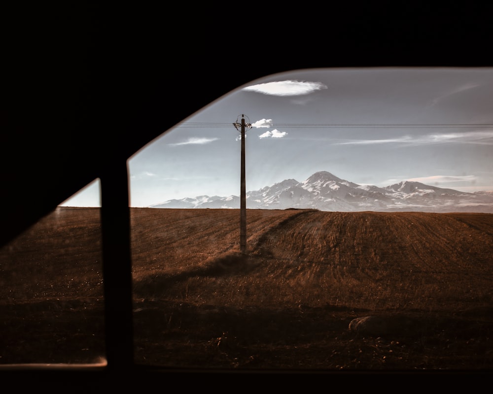 brown mountains under white sky during daytime