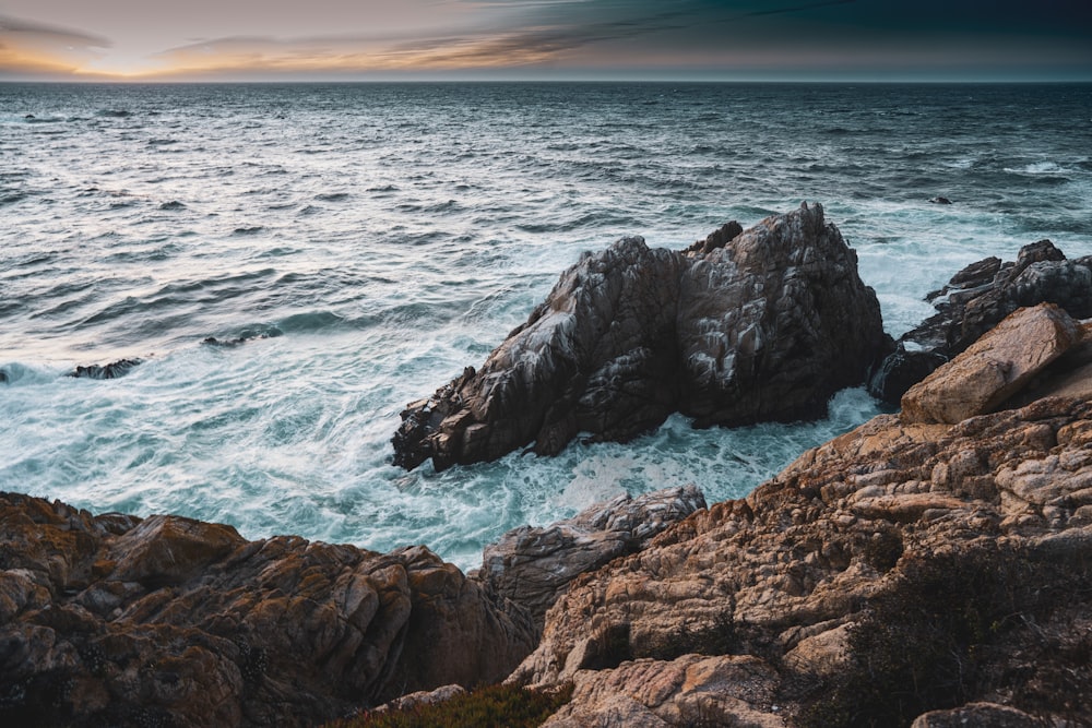 brown rocky shore during daytime