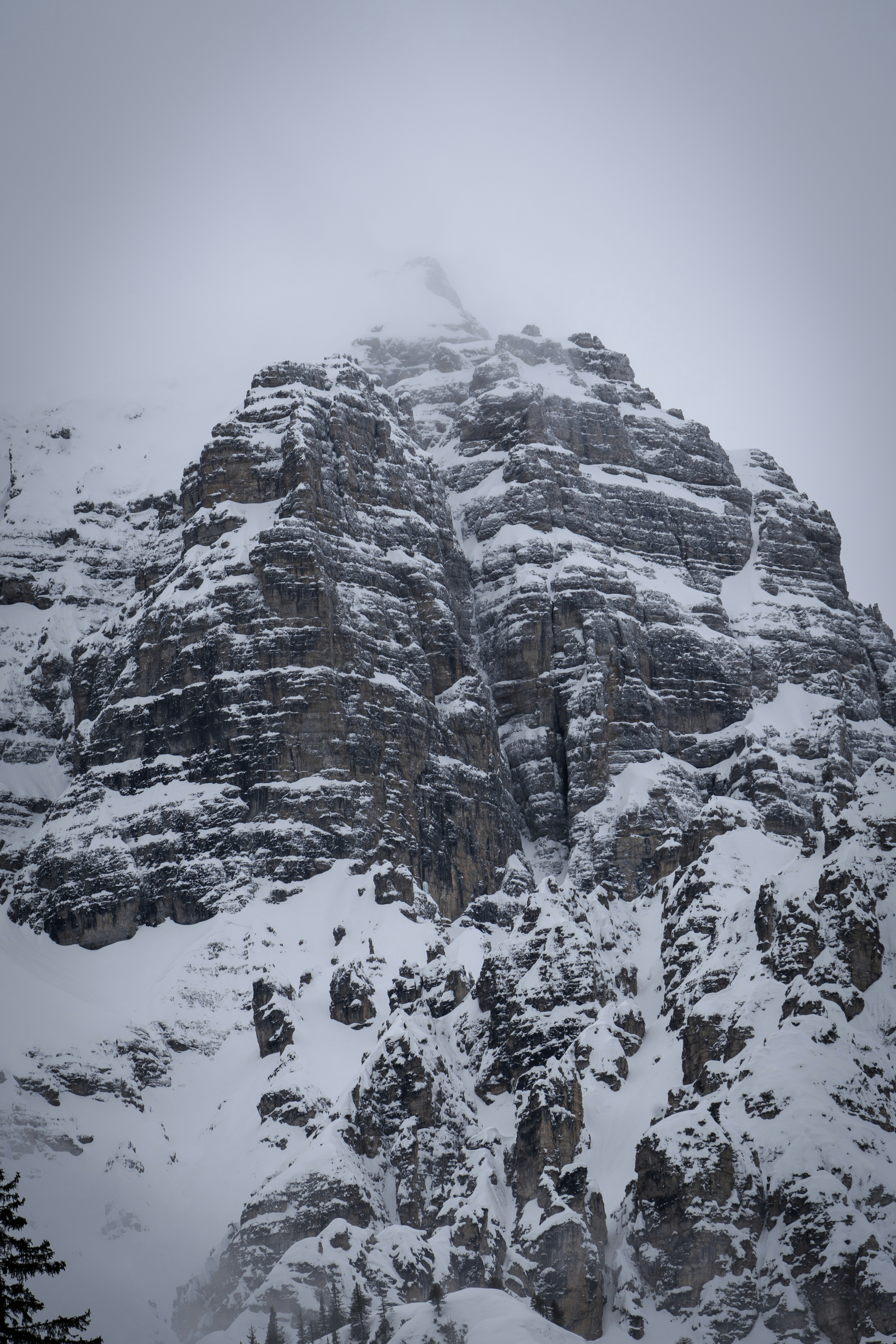 snow covered mountain during daytime