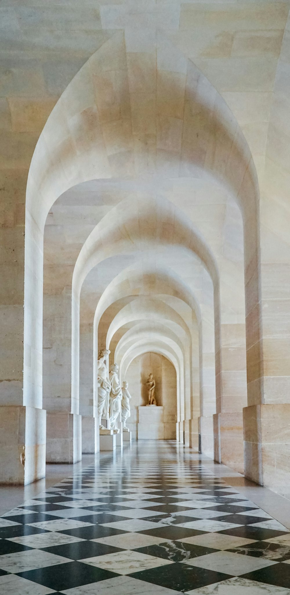 white and brown concrete hallway