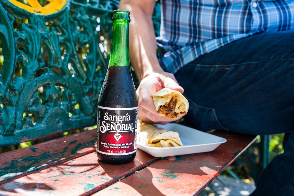 black and red labeled bottle