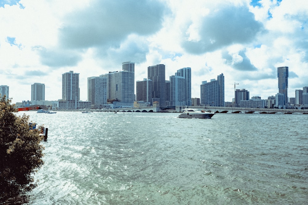 city skyline under cloudy sky during daytime