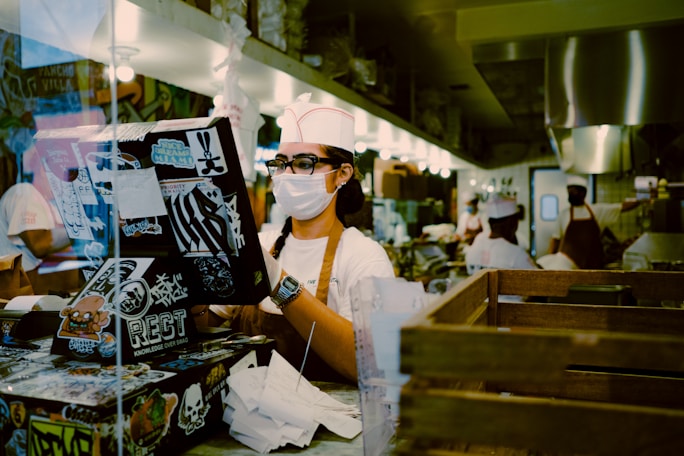 woman in white shirt wearing black sunglasses