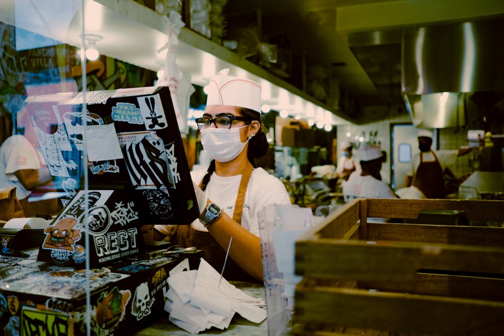 woman in white shirt wearing black sunglasses