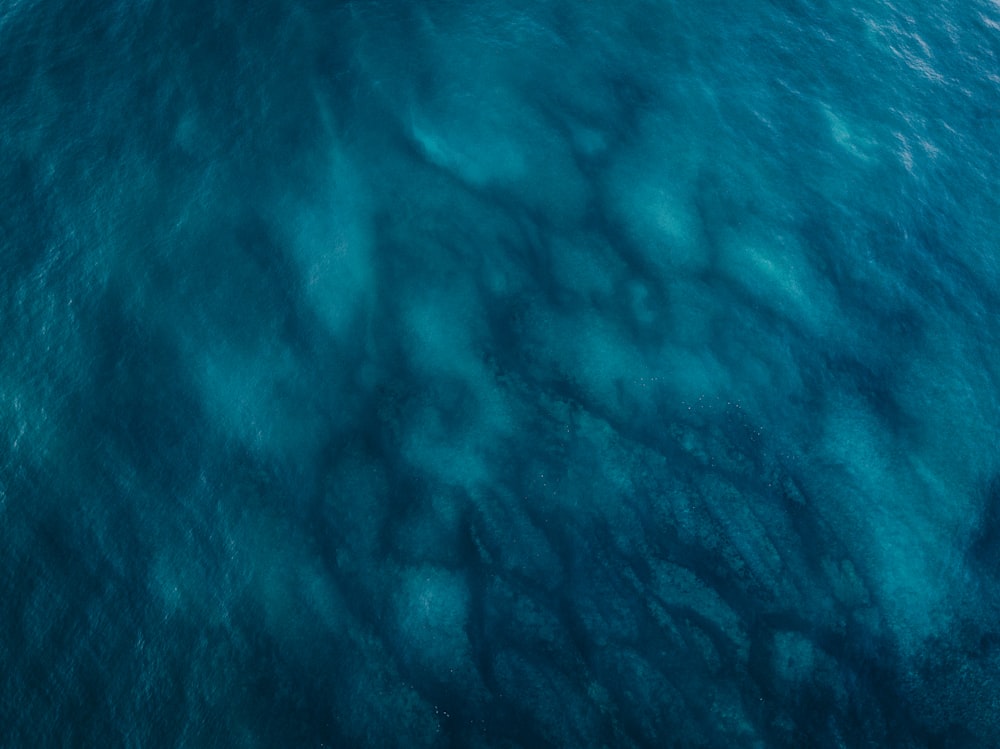 blue water with white bubbles