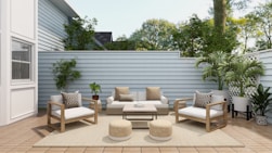 brown 2 seat sofa near white wall