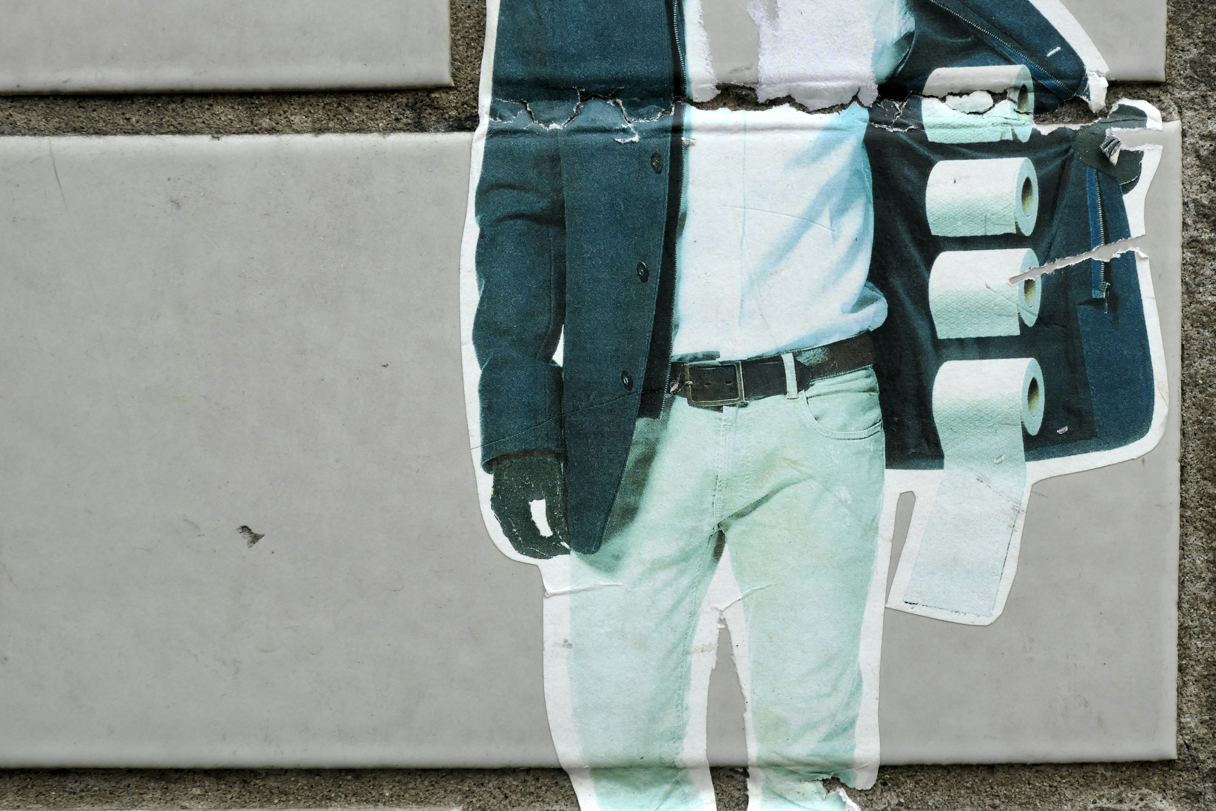 man in blue and white long sleeve shirt and white pants