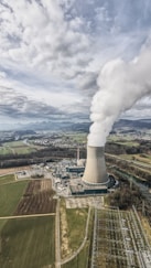 white smoke coming out from factory