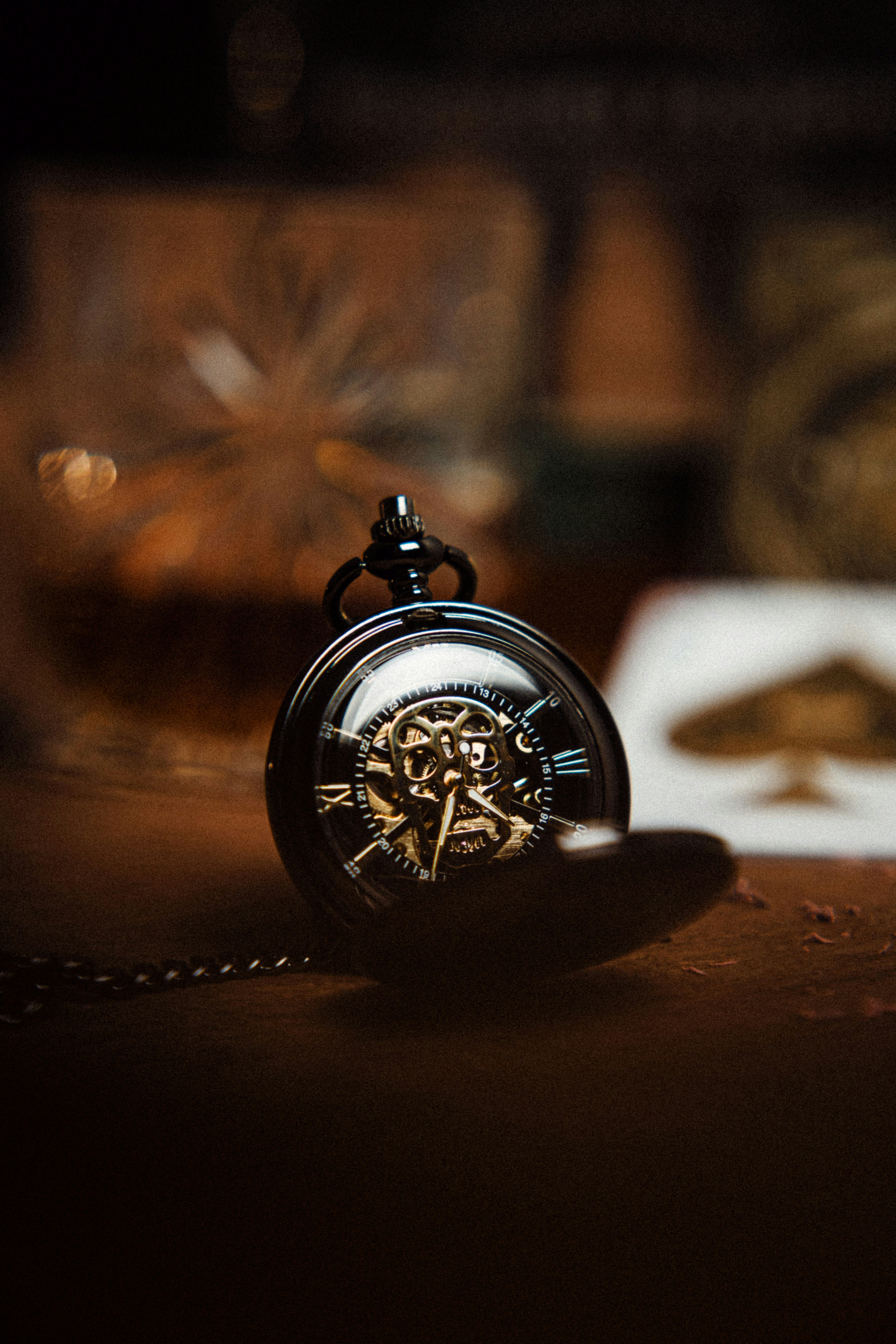 gold and silver pocket watch
